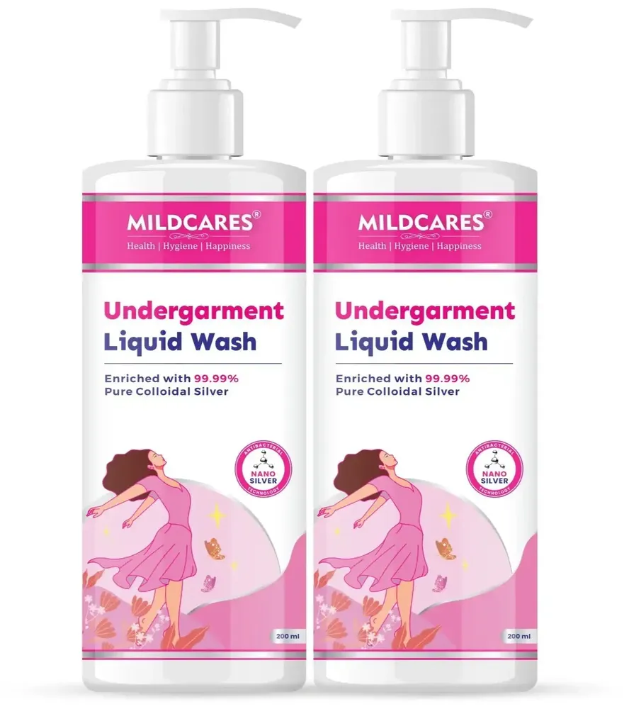 two pump bottle of MILDCARES Undergarments Liquid Wash with a illustration of a woman who is happy and worry free