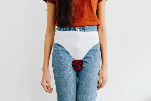 woman wearing a white underwear on her clothes with a flower 