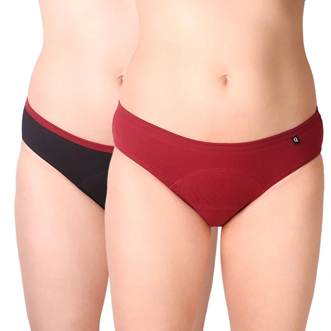 Two pairs of underwear, one black and one red, on a white background.