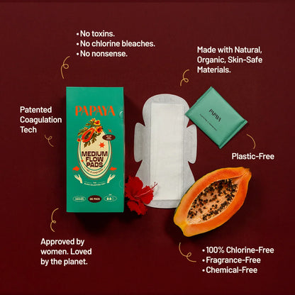 Papaya menstrual product packaging with features on a red background