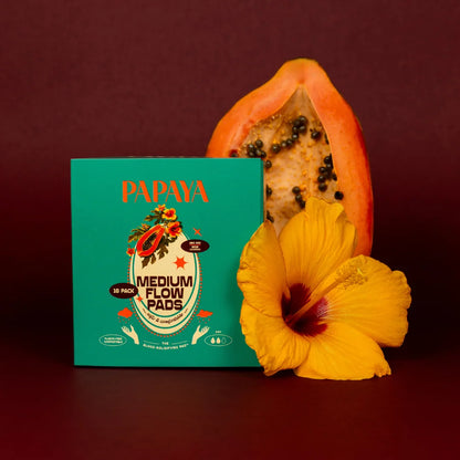 Box of Papaya Medium Flow Pads with a papaya fruit and yellow flower on a dark background