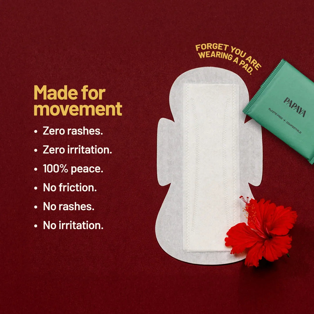 Papaya sanitary pad with red flower on a maroon background