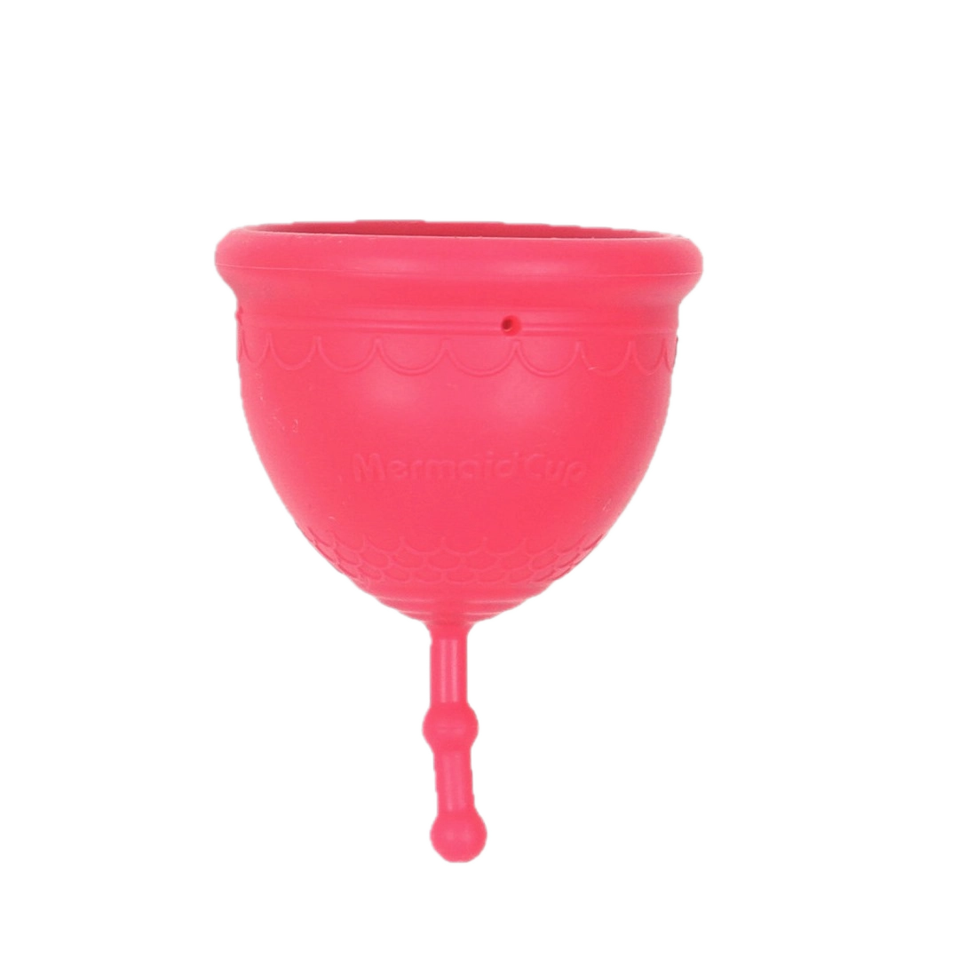 A pink menstrual cup made of medical-grade silicone, designed for low cervix, with a pull string for easy insertion.