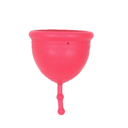 A pink menstrual cup made of medical-grade silicone, designed for low cervix, with a pull string for easy insertion.